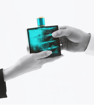 business-woman-giving-parfume-for-gift-picture-id520298218
