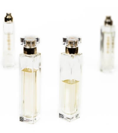 used-female-parfumes-on-the-white-background-picture-id899199934